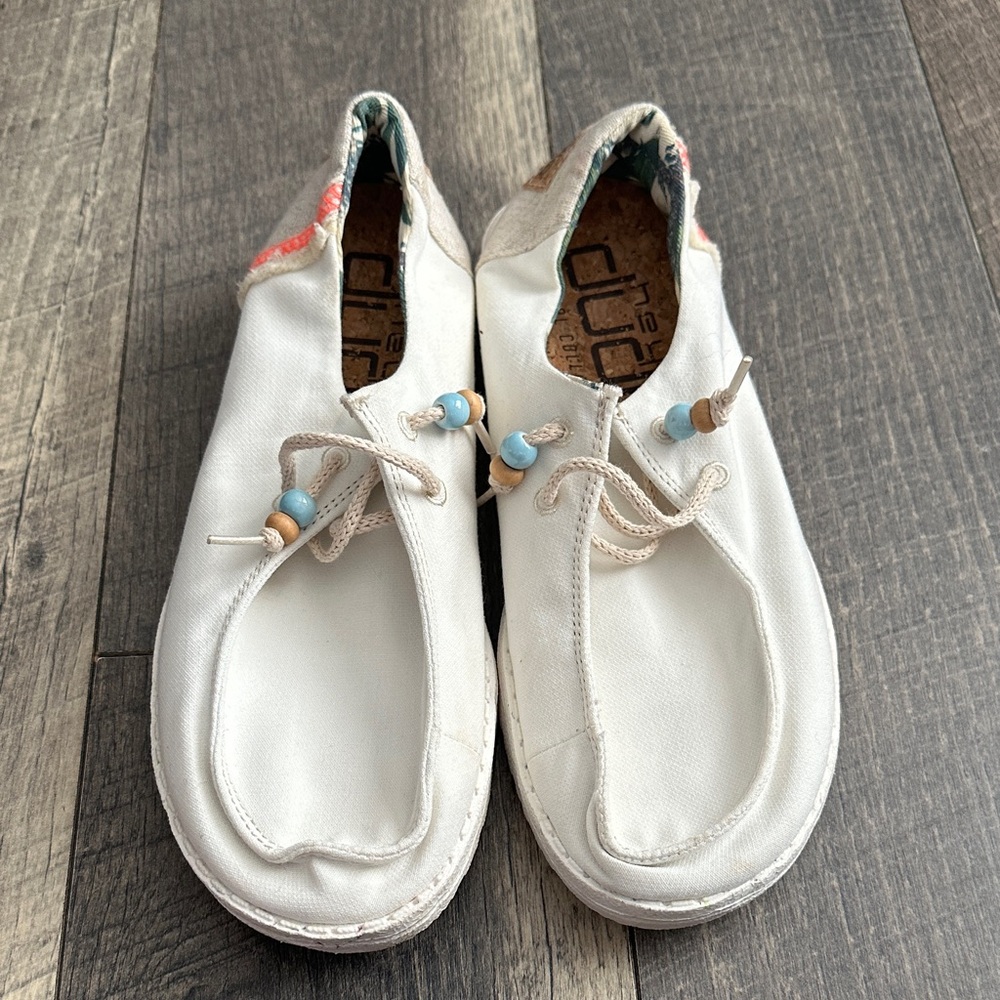 Woman’s White Canvas Slip-On Shoes with Bead Accent